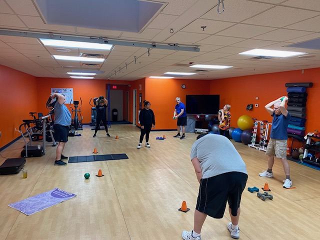 Morning group fitness class at Rochester School of Fitness